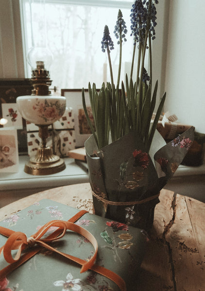 Flowers on dark grey wrapping paper