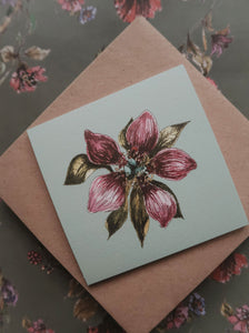 Purple flower on light blue small flat card