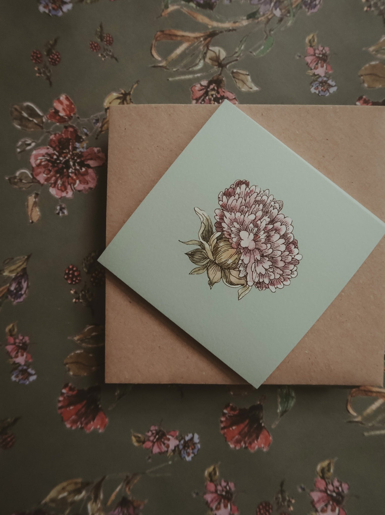 Light purple flower on light blue small flat card