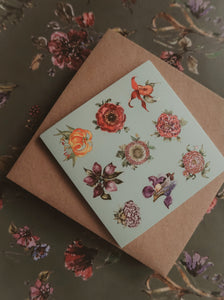 Small flowers on light blue small flat card