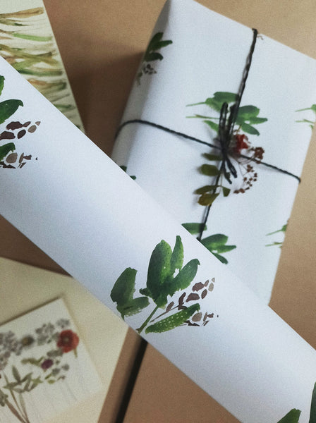 Green leaves white wrapping paper