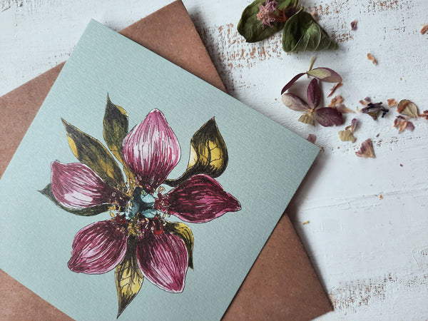 Purple flower on light blue small flat card