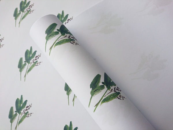 Green leaves white wrapping paper